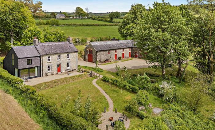 A general birds eye view of the former farm new Pencader, in Carmarthenshire, now Cambrian Cottages.